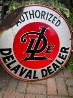 Authorized DeLaval Dealer metal sign
