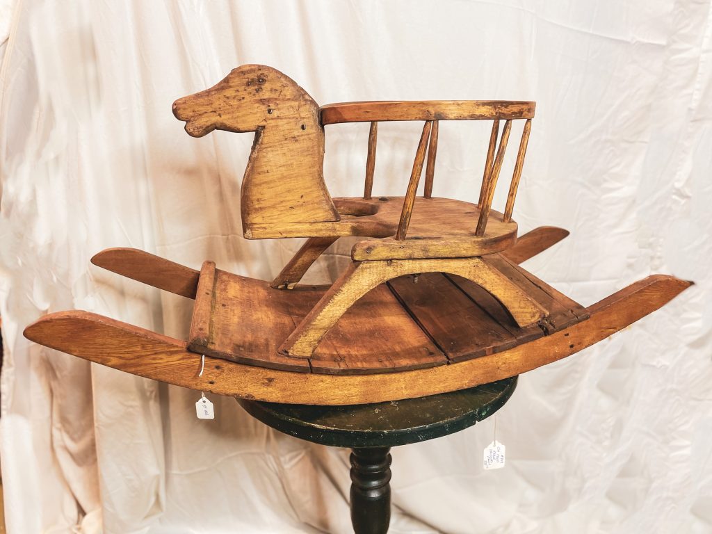 A Horse Rocker ca. 1850.  Various types of wood, square nails and has been well loved.  Completely restored 34