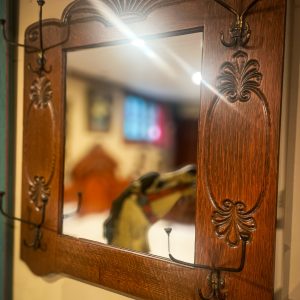 Antique Oak Mirror with Hooks. 385.00 CND