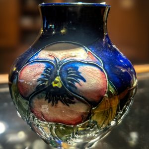 3.5" vase. Pansy Nouveau design by Walter Moorcroft. Signed $195